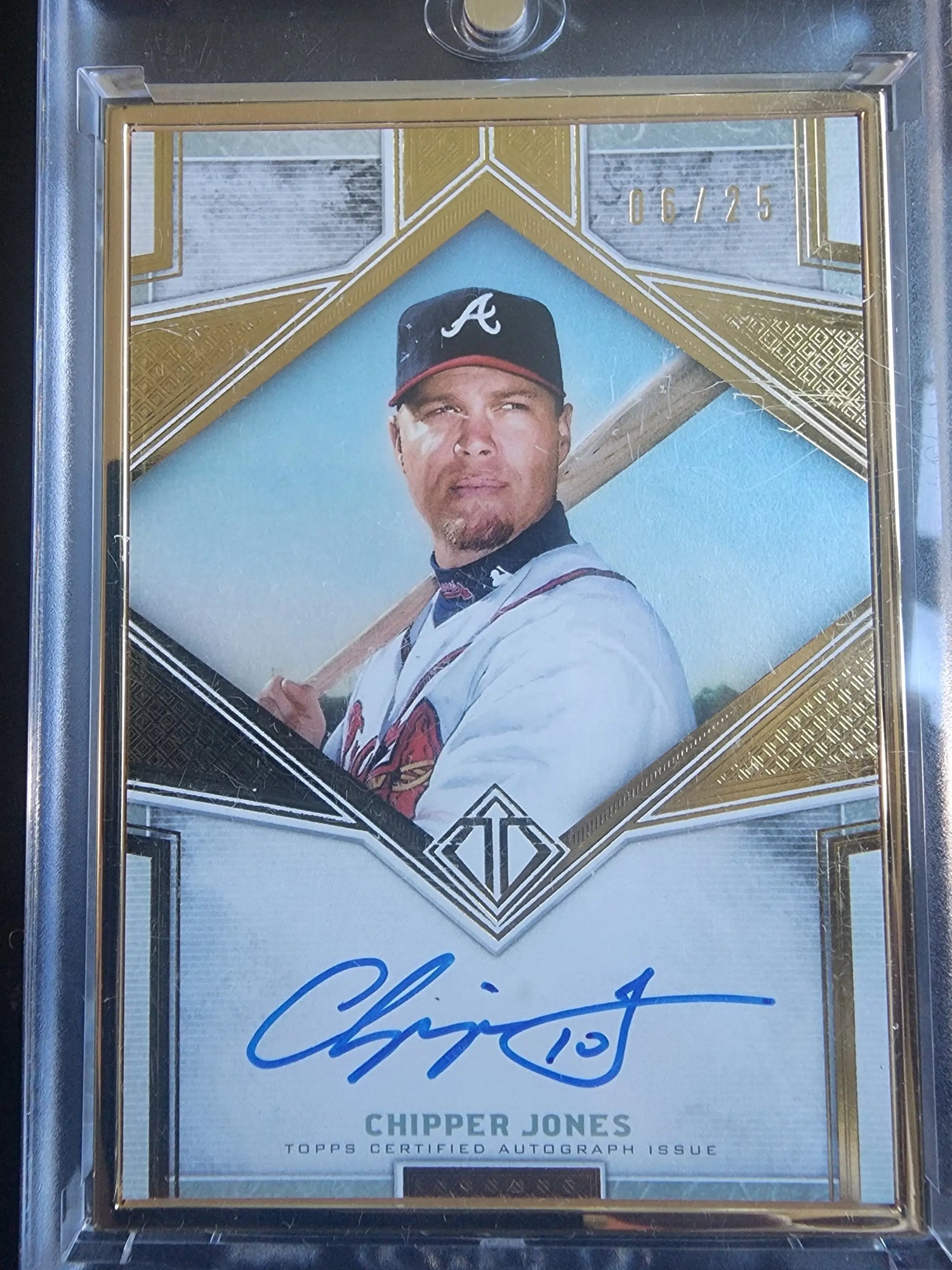 Chipper Jones autographed baseball card from Topps Transcendent Framed Auto series