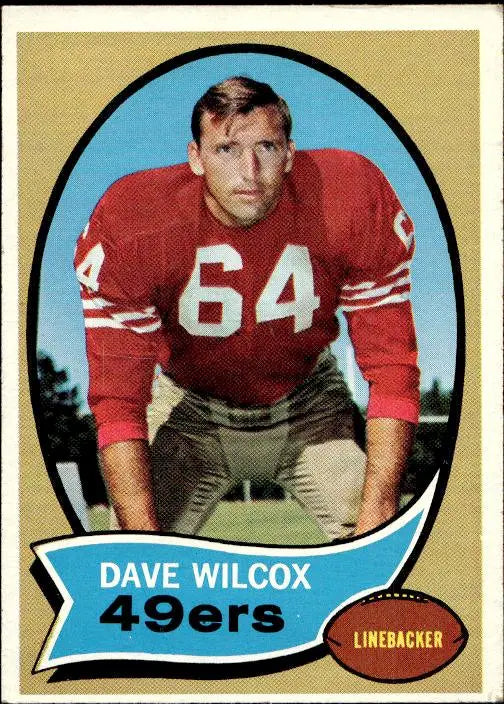 Red and white number 64 football jersey worn by dave wilcox, a linebacker for the san francisco 49ers.