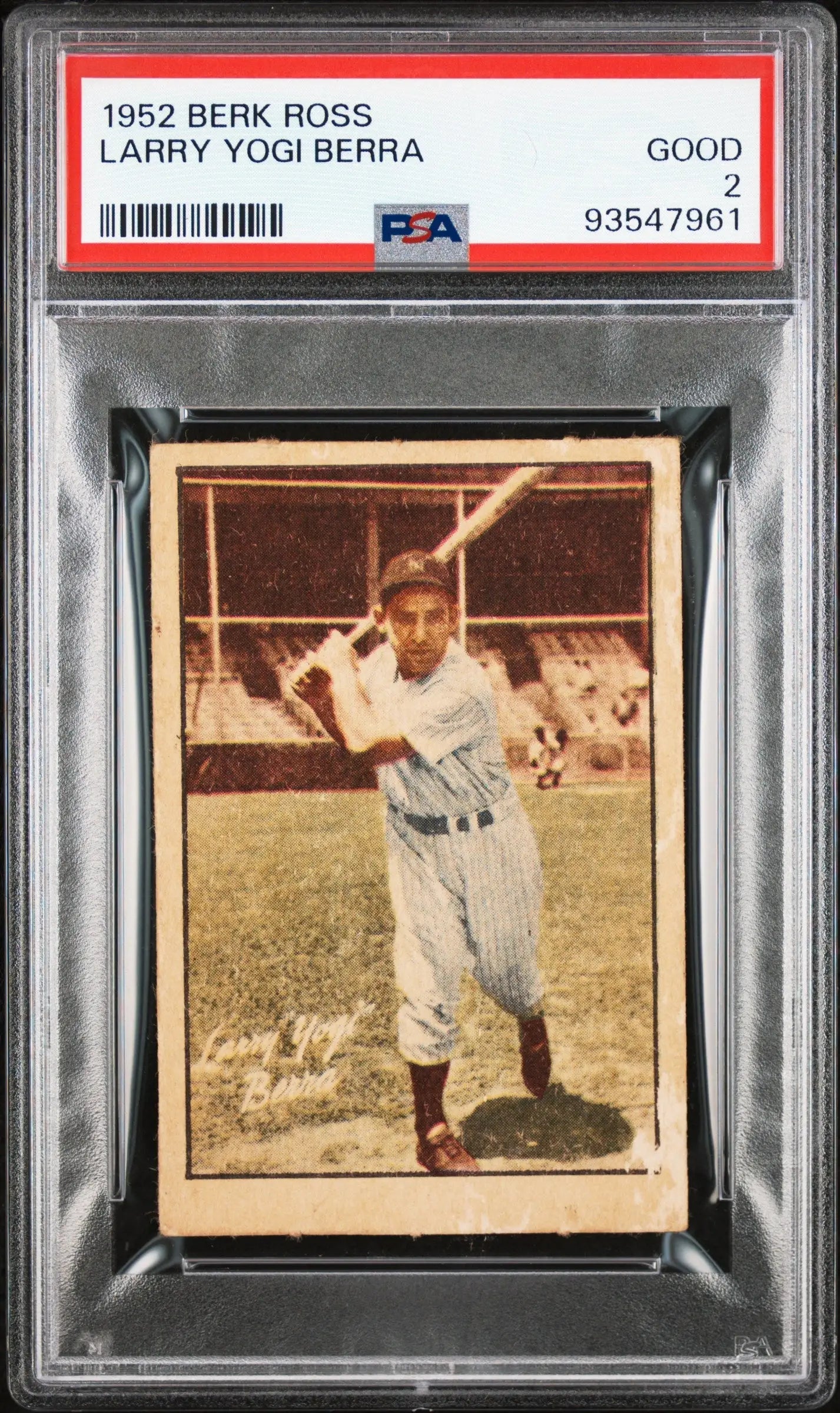 1952 berk ross baseball card featuring larry yogi berra in a pinstriped uniform, encased in a psa graded protective slab.