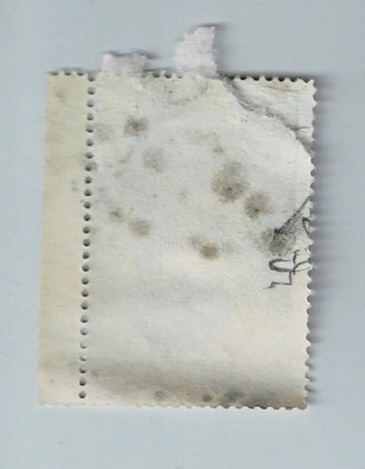 Damaged, stained postage stamp from 1964 Bazooka Gum Joe Pepitone baseball card