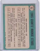 Baseball card featuring Ken Henderson and Jack Hiatt on light blue, Topps Baseball design