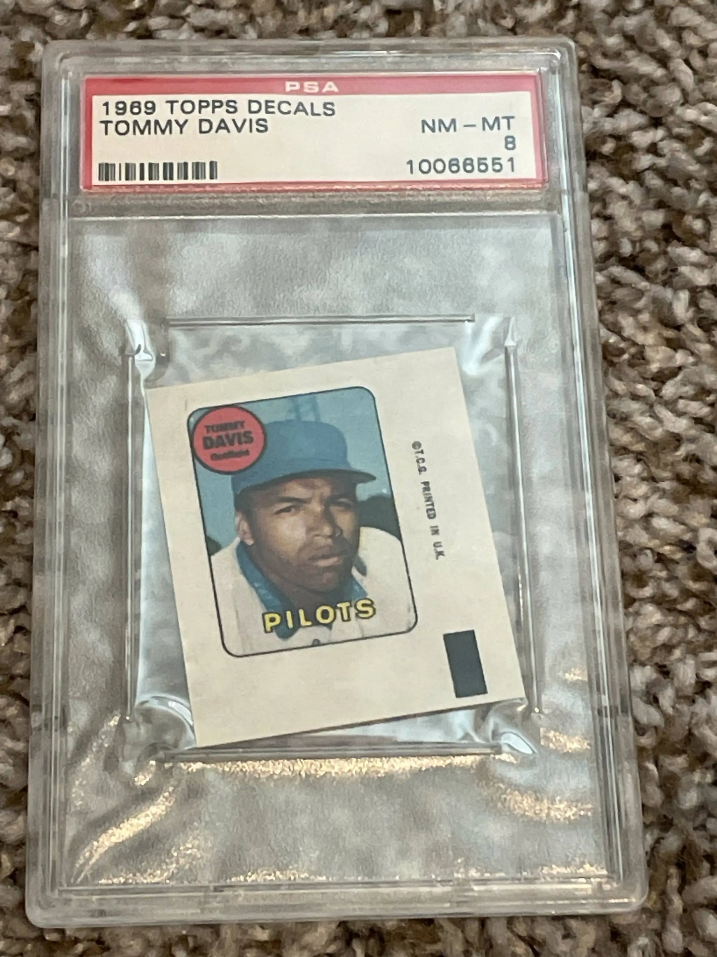 Tommy Davis baseball card in case from 1969 Topps Decals set, graded PSA 8