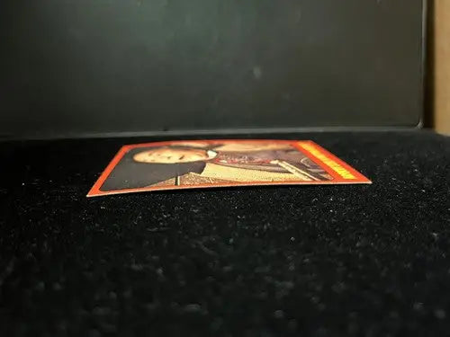 Curved trading card from 1975 Shock Theater Shocking Laffs Topps US Test Version