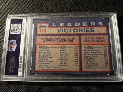 1984 Topps #715 AL Win Leaders (Jim Palmer / D. Sutton / T. John). PSA 7 NRMT - Baseball Card Single