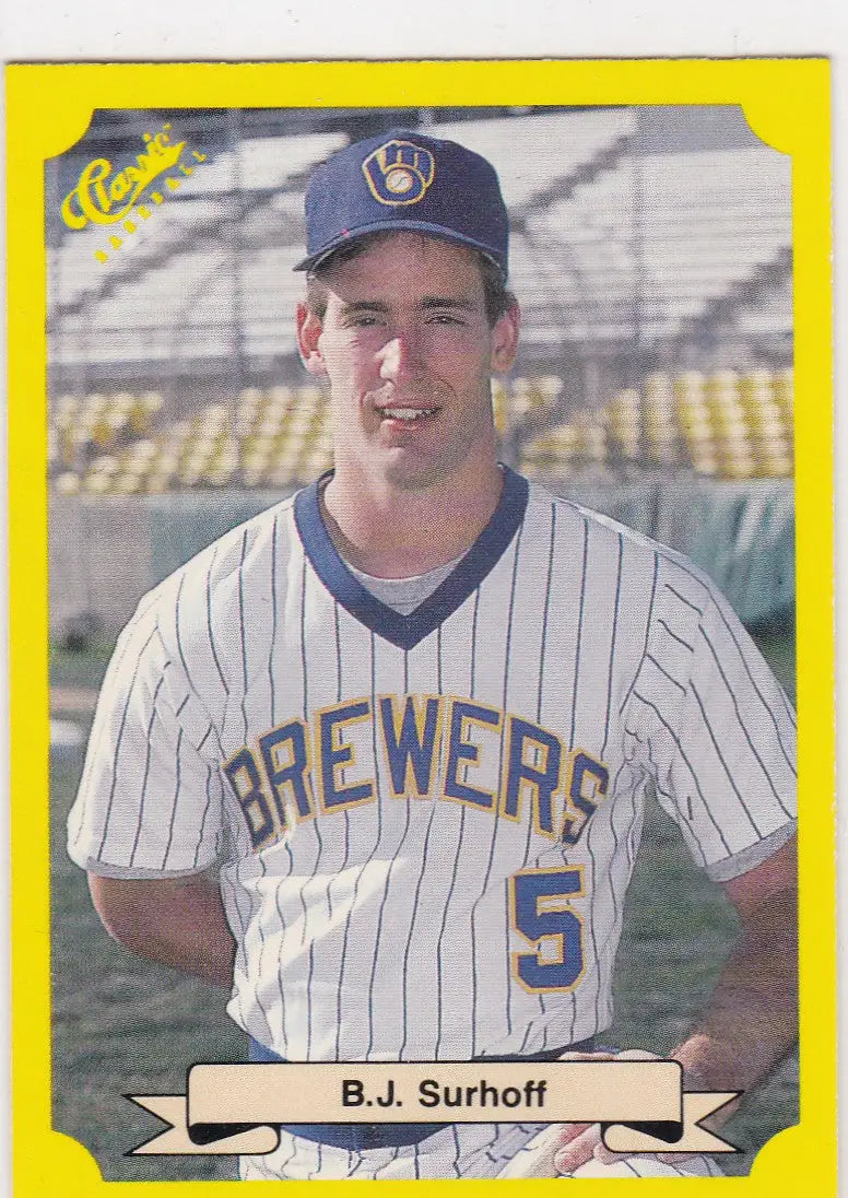 Baseball trading card featuring B J Surhoff in yellow Milwaukee Brewers uniform, classic baseball collectible