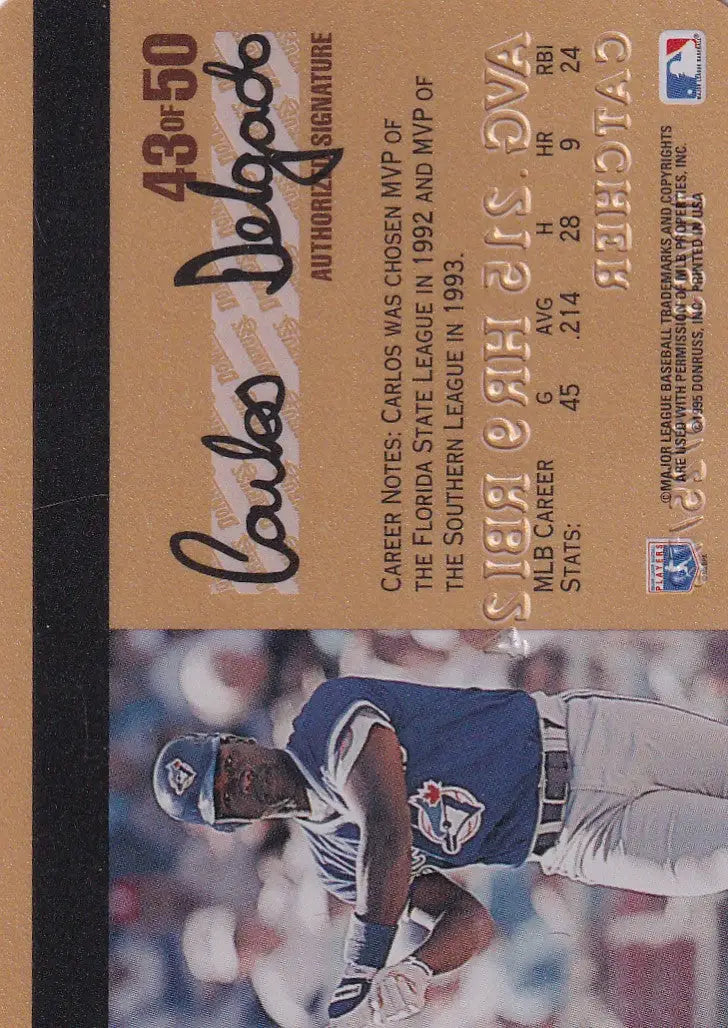 Baseball card of Carlos Delgado sliding into base from 1995 Leaf Studio Baseball Gold