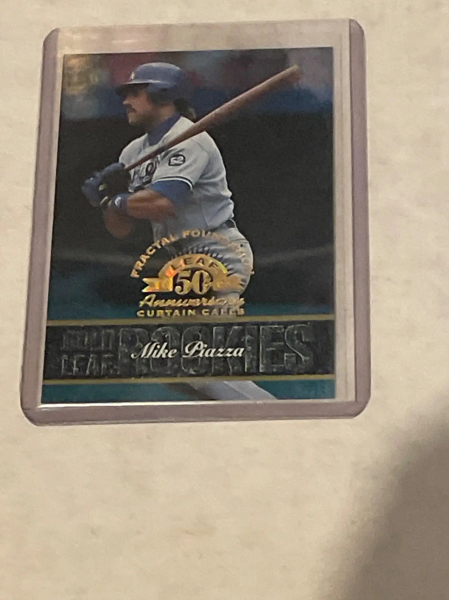 Baseball card of Mike Piazza batting from the 1998 Leaf Fractal Foundations series