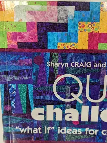 Book with colorful patchwork quilt cover for 2009 Quilt Challenge store shelf pulls