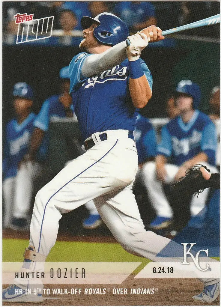 Baseball player in blue Kansas City Royals uniform swinging bat for Hunter Dozier win