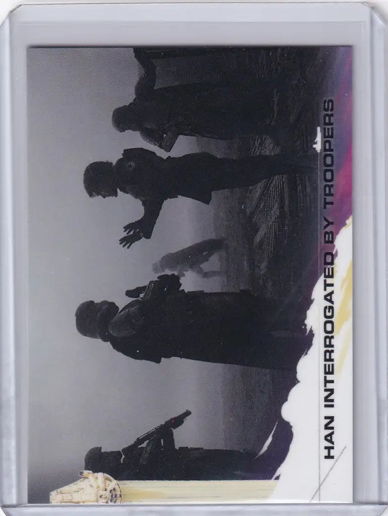 Trading card featuring silhouettes from Solo: A Star Wars Story and Han Solo interrogation