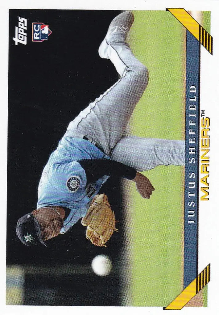 Baseball player in light blue diving to catch a ball from Topps Archives Justus Sheffield