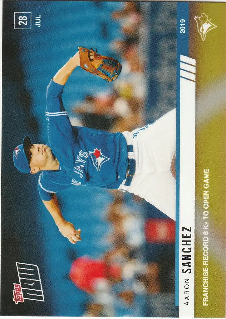 Baseball player in blue Toronto Blue Jays uniform pitching during start game Toronto