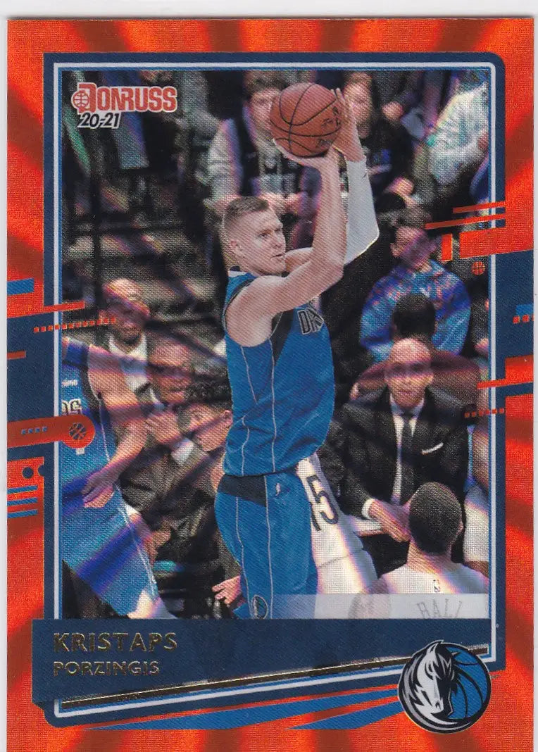 Basketball trading card of Kristaps Porzingis in blue uniform shooting ball, Porzingis Orange Laser