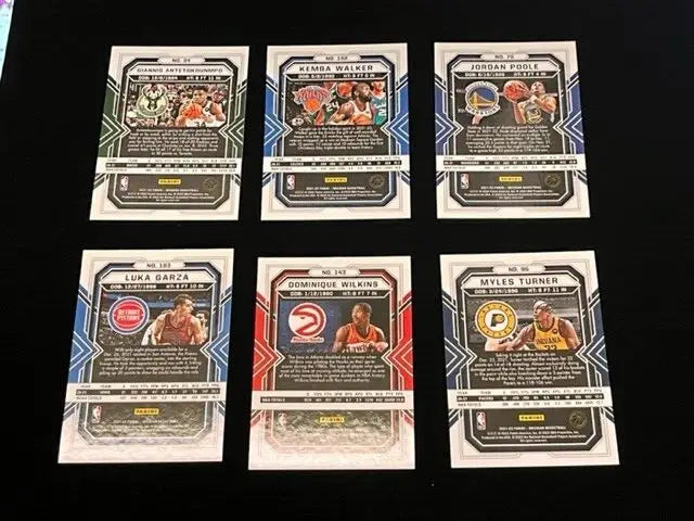 Six basketball cards featuring 2021-22 Obsidian Jordan Poole White Pulsar Rewards Pack Exclusive