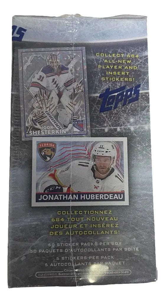 Sealed pack of NHL trading cards and stickers featuring player images and metallic designs