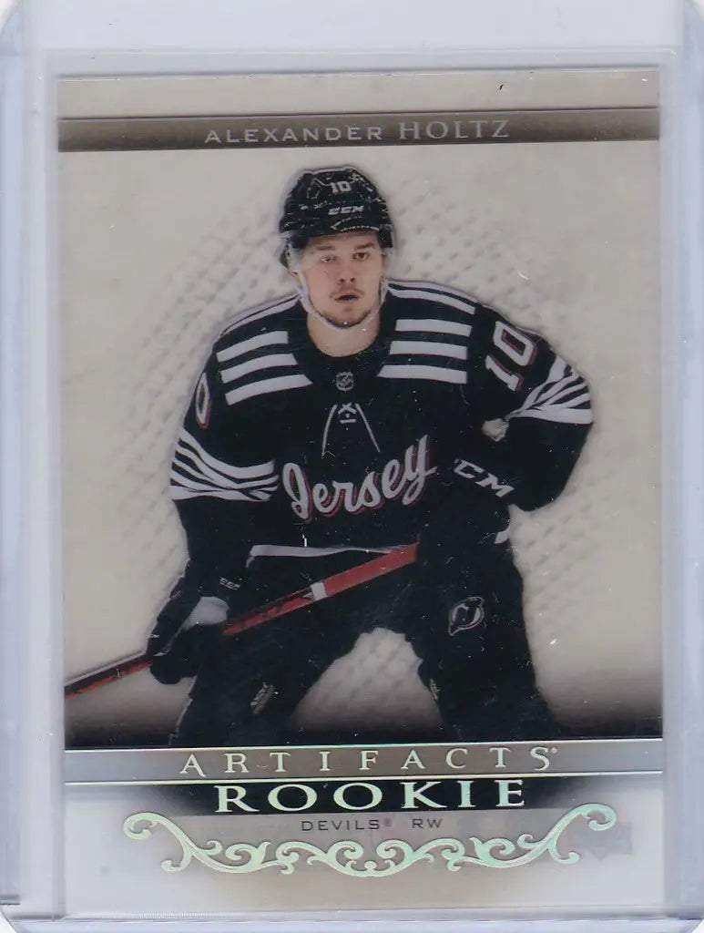 Hockey trading card of Alexander Holtz in dark jersey from Upper Deck Artifacts collection