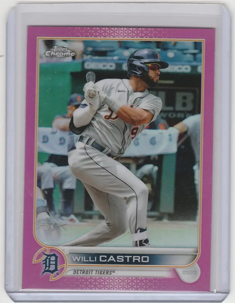 Baseball card of Willi Castro swinging bat from 2022 Topps Chrome Pink Detroit Tigers