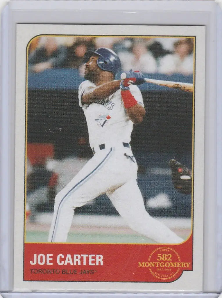 Baseball card of Joe Carter mid-swing in white uniform for Toronto Blue Jays