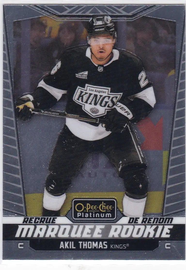 Black and white Los Angeles Kings Akil Thomas platinum marquee rookie trading card