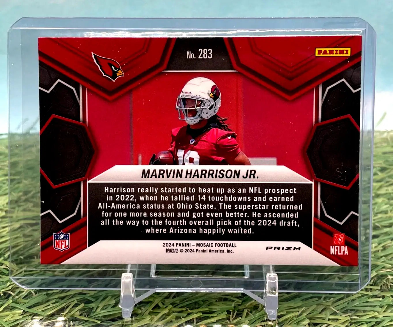 Football trading card of Marvin Harrison in red uniform on green mosaic prizm background