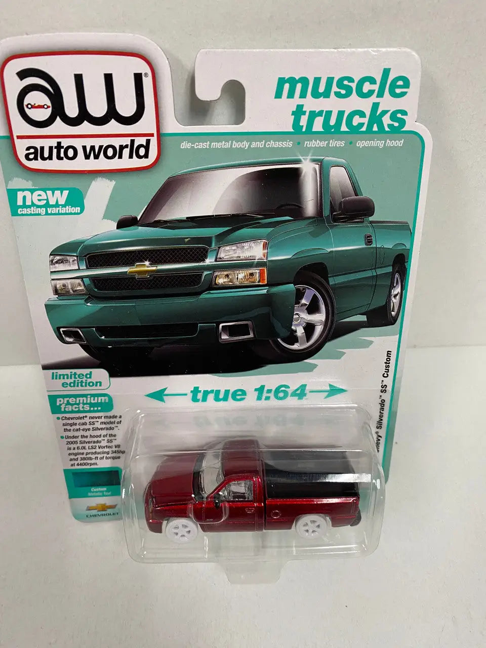 Toy muscle truck in packaging from Auto World Silverado SS Series 2005 Chevy Silverado