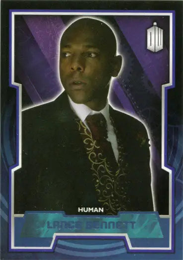 Portrait of a bald man in a dark suit on Doctor Who Blue Foil Parallel Card