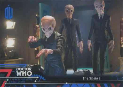 Three extraterrestrial figures in dark suits on Doctor Who Blue Parallel Chase Card 41