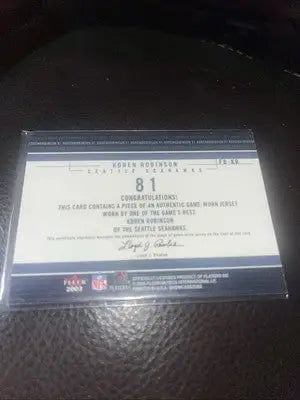 Koren Robinson game-worn jersey card from Fleer Football Best Jersey Game series