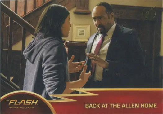 Two people converse near a staircase on Flash Season 1 Gold Logo Parallel Chase Card