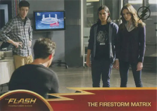 Group of people in office with TV, featured in Flash Season 1 Gold Logo Parallel Chase Card