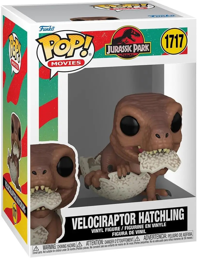 Funko Pop Velociraptor Hatchling from Jurassic Park emerging from egg shell