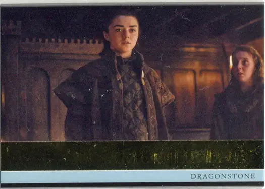 Two young people in medieval clothing in dim light, featured on a Game of Thrones chase card
