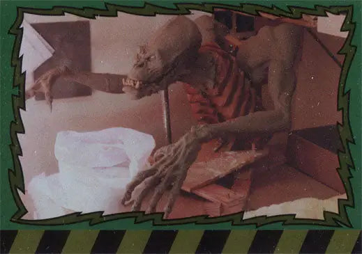 Grotesque skeletal figure with elongated limbs on Ghostbusters Scenes B1 Foil Parallel Chase Card