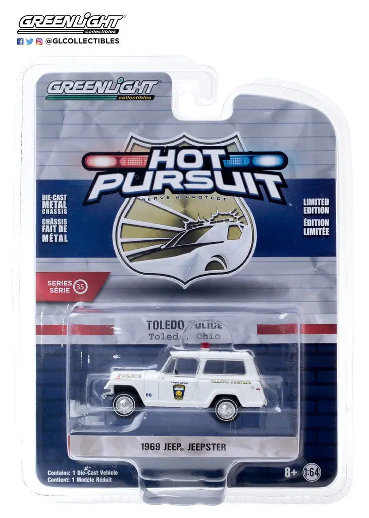 Die-cast model of a white 1969 Jeep Jeepster Ohio Police in packaging from Hot Pursuit Series