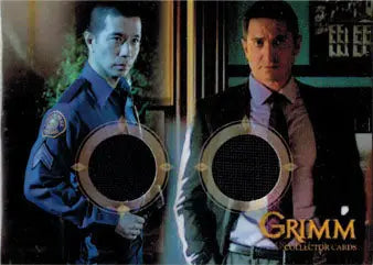 Trading card featuring circular cutouts and Grimm logo, highlighting Reggie Lee and Sasha Roiz