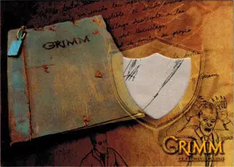 Worn book with GRIMM on cover featured in Grimm 2013 Prop Card Murccielago Page