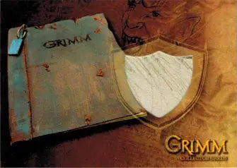 Worn Grimm book with shield-shaped Blutbad page in collectible trading card design
