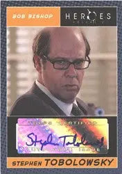 Stephen Tobolowsky Autograph Card featuring a bespectacled man in a suit on orange background