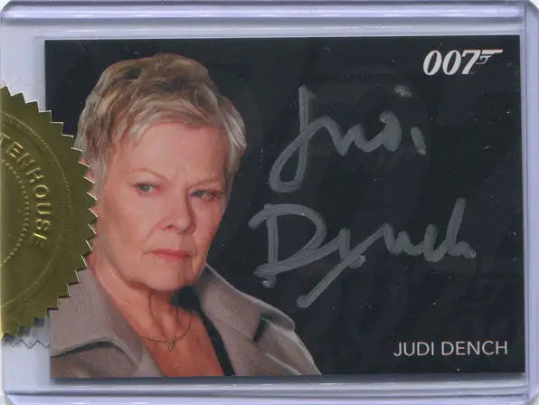 Autographed James Bond signature autograph card of Judi Dench with short blonde hair