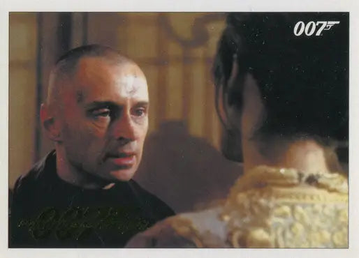 Man in black turtleneck showcasing James Bond 007 Gold Parallel trading card
