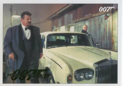 Cream-colored Rolls-Royce luxury car with man in suit in James Bond 007 Classics Gold Parallel