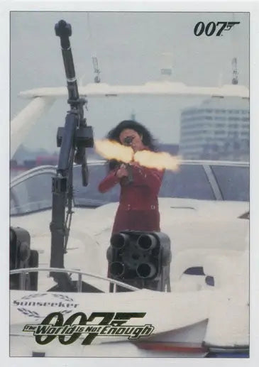 Woman in red outfit firing gun on boat in James Bond 007 Classics Gold Parallel trading card