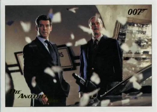 Two men in suits with 007 logo, featured in James Bond gold foil trading card