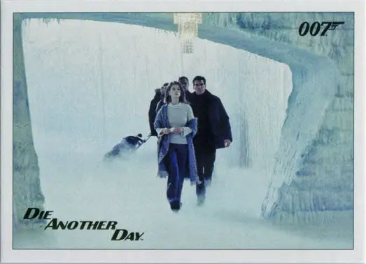 Two people running in an icy corridor on James Bond Gold Foil trading card