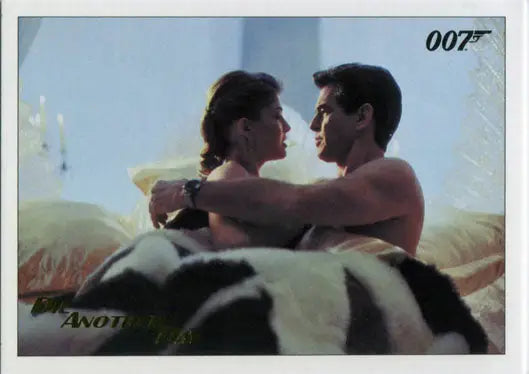 Romantic embrace of a couple with 007 logo in James Bond Archives Gold Foil Trading Card