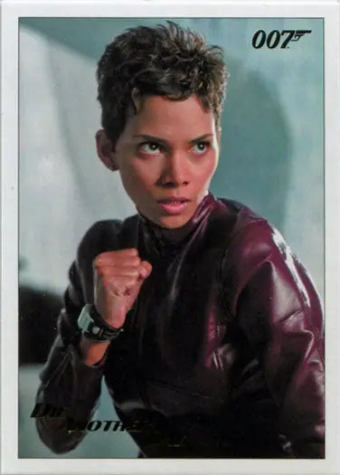 Woman with short dark hair in purple leather jacket raises fist on Gold Foil Trading Card