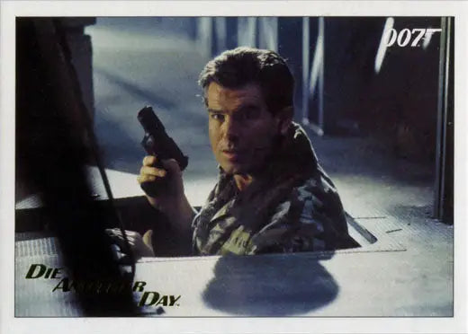 Man in military attire with handgun featured on James Bond trading card gold foil