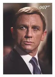 Serious man in dark suit with 007 logo on James Bond Archives promo card design