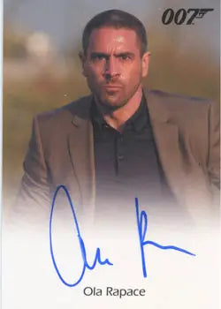 Autographed Ola Rapace trading card featuring 007 logo on tan suit jacket