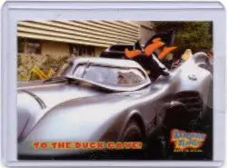 Futuristic silver car with orange accents on Looney Tunes Case Topper for trading cards